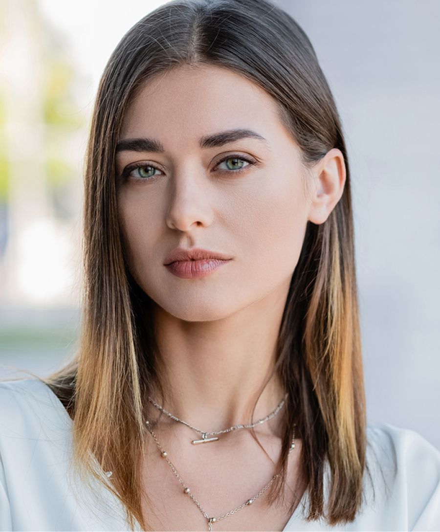 Branson lip filler model with brown hair